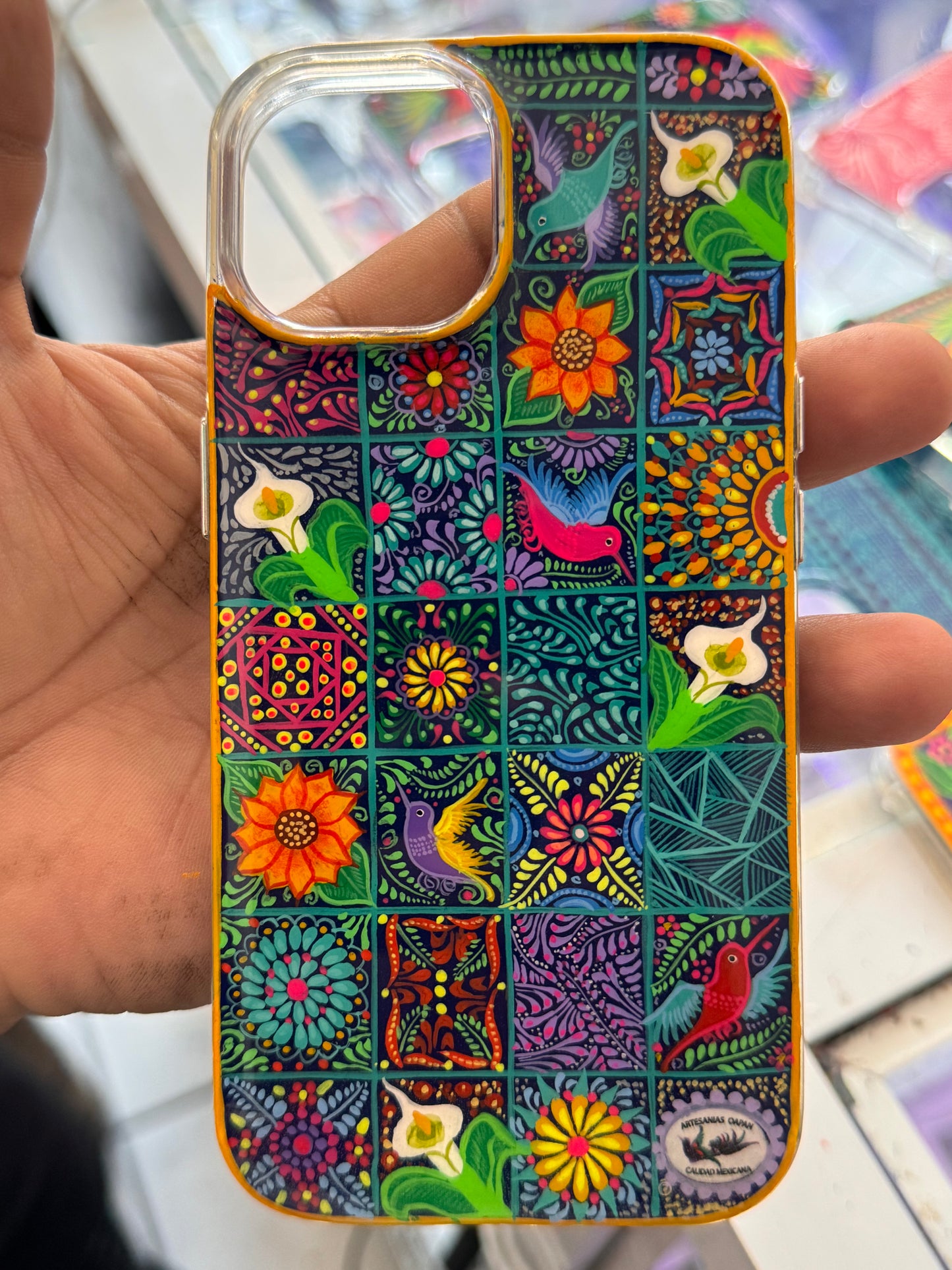 Diseño estilo Talavera colorida en fondo azul para iPhone
